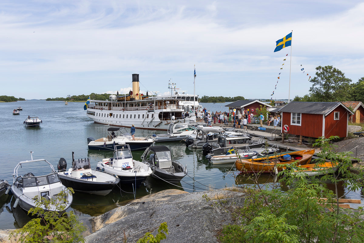 Ångfartyget s/s Blidösund vid Ångbåtsbryggan på Rödlöga. Foto: Tomas Södergren